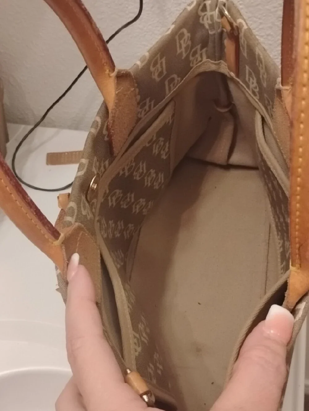 Dooney & Bourke Beige/Tan Signature Logo Tote with Tassel